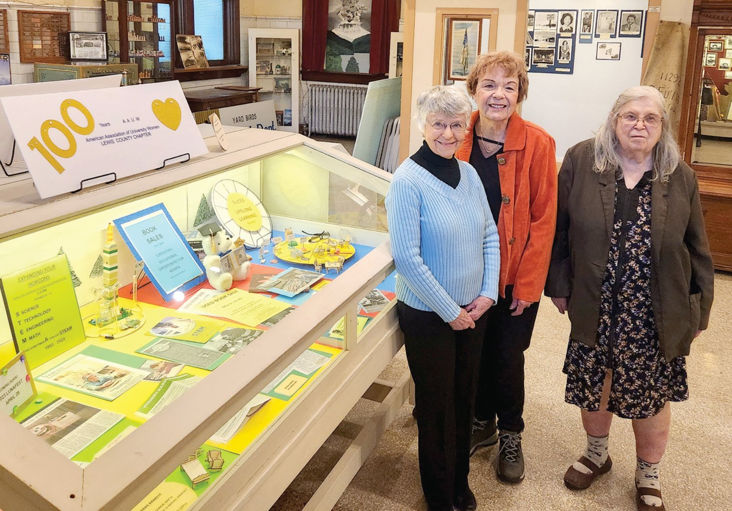 From left, Priscilla Tiller, Jan Leth and Luana Graves pose for a photo at the Lewis County Historical Museum.